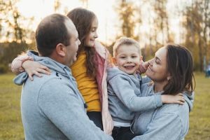 A family laughs together.